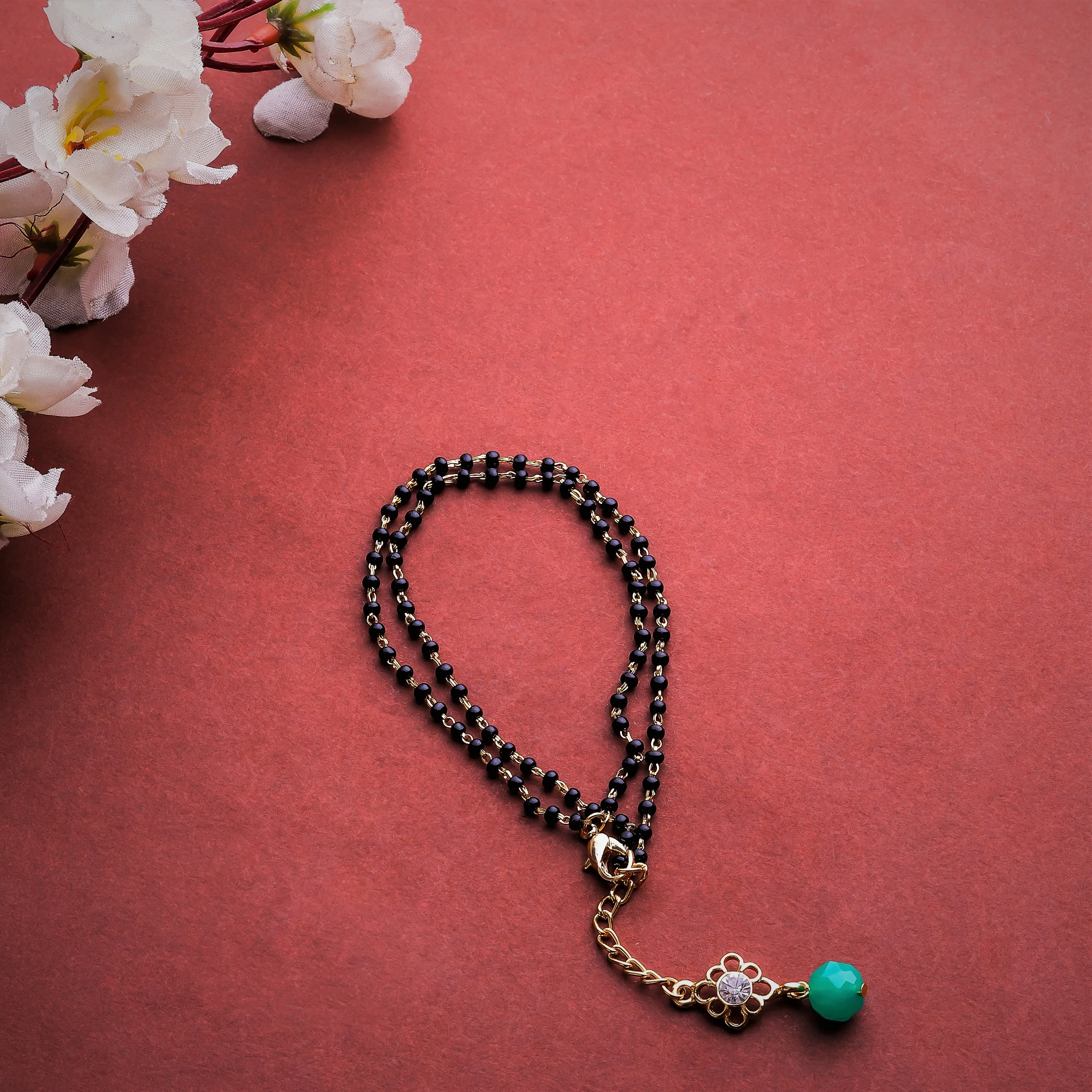 Estele Gold Plated Floret Designer Black & Green Beads Bracelet with Austrian Crystal for Women