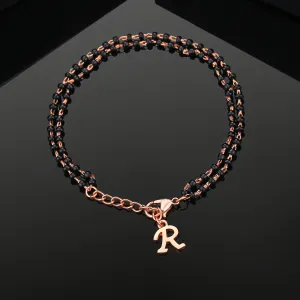 Estele Rose Gold Plated Personalized "R" Initial Mangalsutra Charm Bracelet with Black Beads for Women