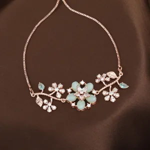 Estele Rosegold Plated Flower-Decorated Mint Green Beaded Adjustable Charm Bracelet|A Graceful Wristlet for Modern Ladies