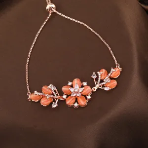 Estele Rosegold Plated Mint Orange Beads Accented Adjustable Floral Varya Bracelet|A Stylish Ornament for Trendy Women