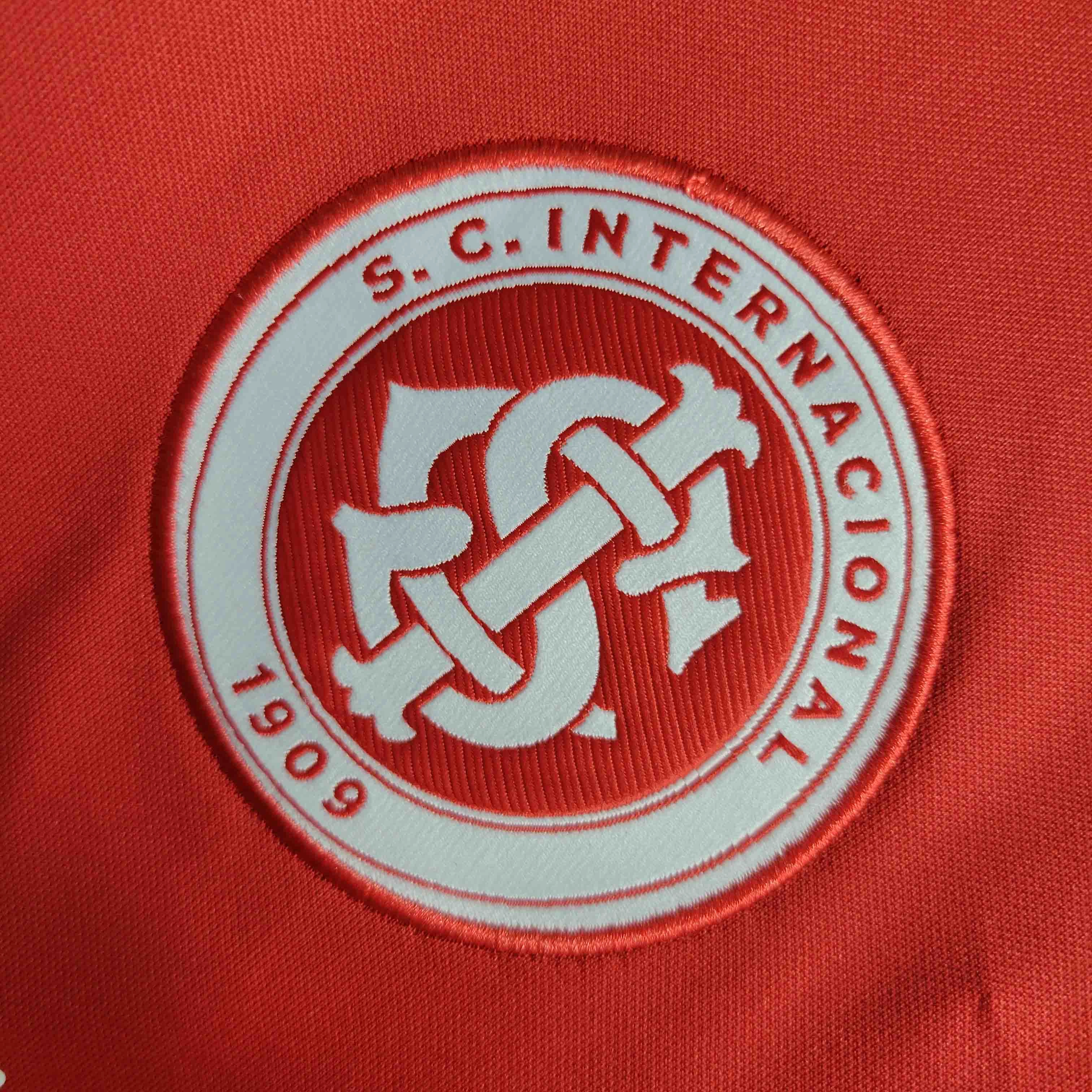 premier league mugs Camisa Internacional I 23/24   Patrocnios - Verso - Torcedor