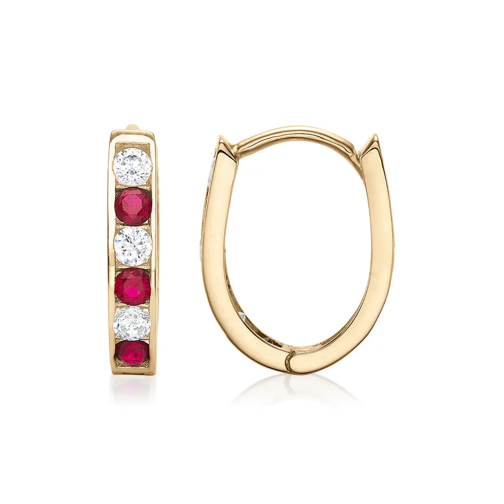 Round Brilliant hoop earrings with ruby and diamond simulants in 10 carat yellow gold