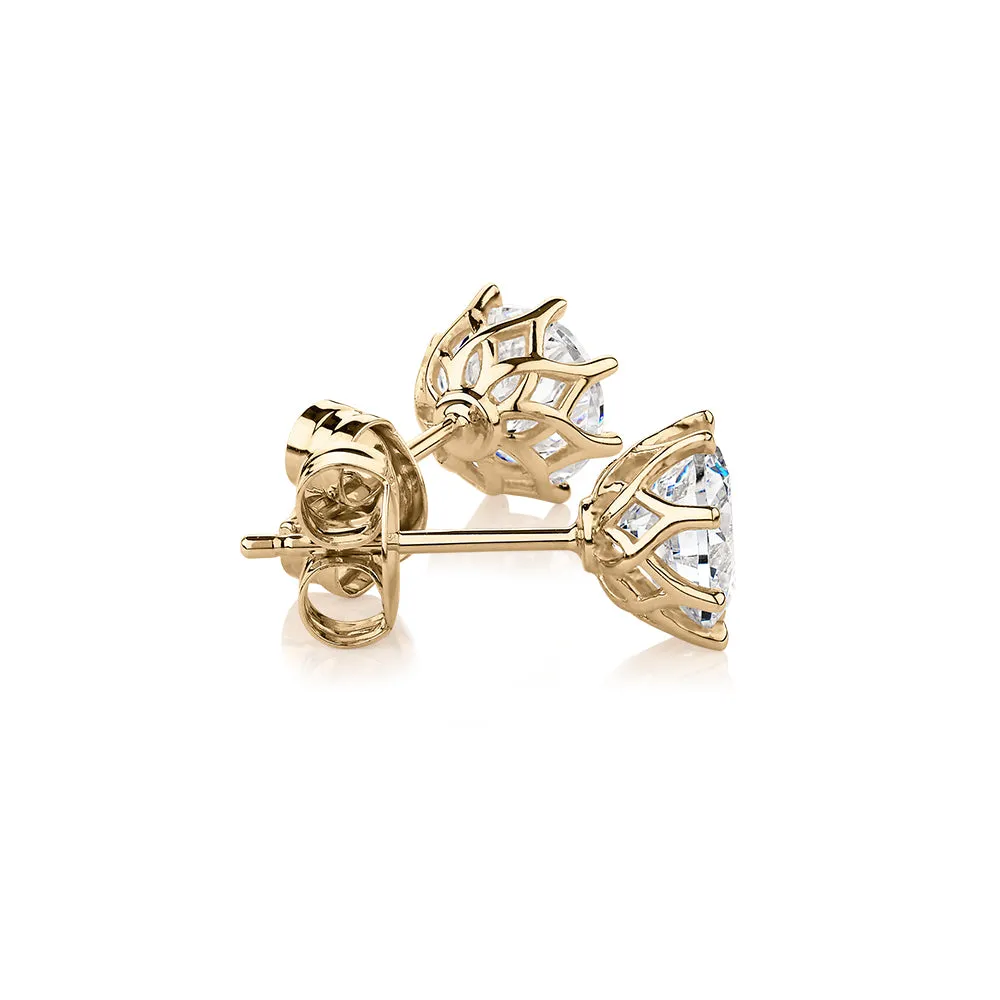 Round Brilliant stud earrings with 2 carats* of diamond simulants in 10 carat yellow gold