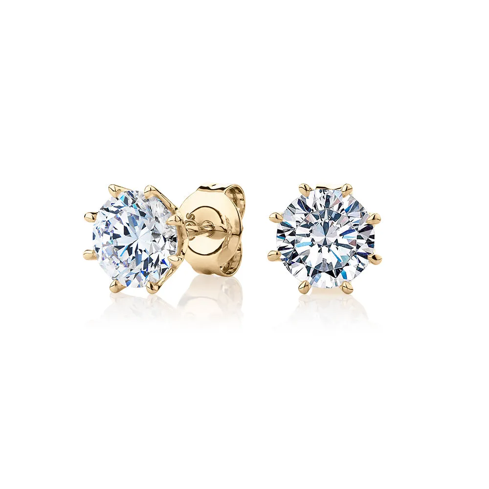 Round Brilliant stud earrings with 2 carats* of diamond simulants in 10 carat yellow gold